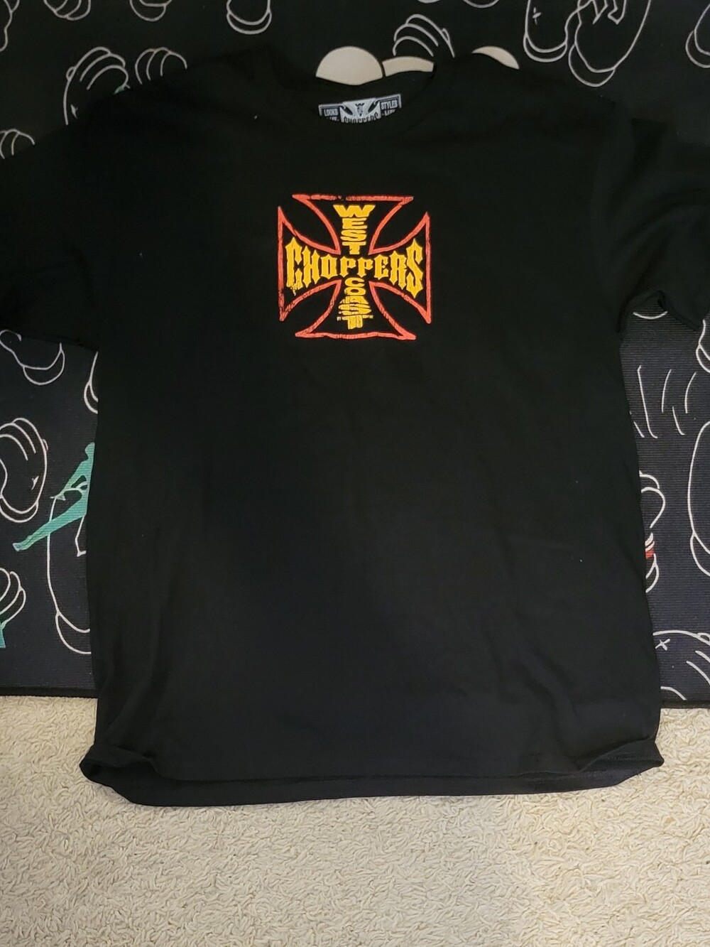 Black Short-Sleeve Tee with Yellow & Red Cross Graphic